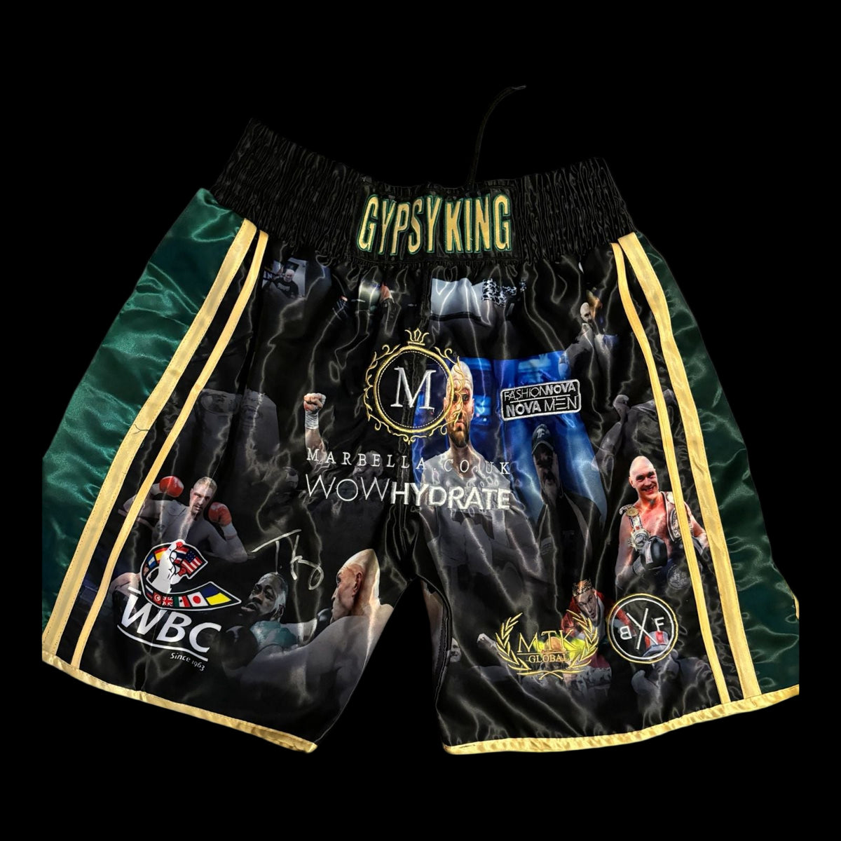 Hand-signed Tyson Fury "Gypsy King" boxing shorts with bold autograph on the front.