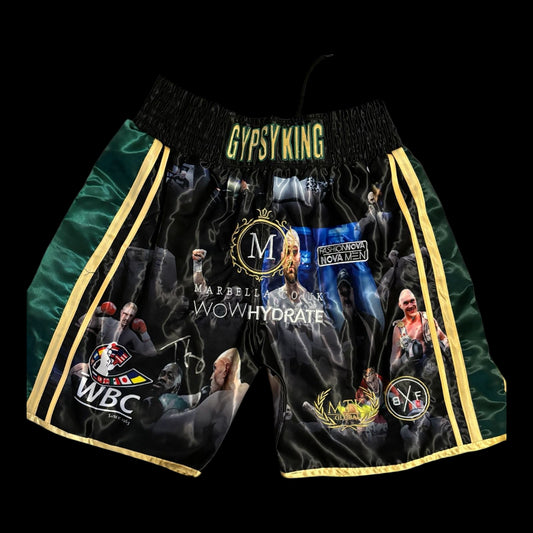 Hand-signed Tyson Fury "Gypsy King" boxing shorts with bold autograph on the front.