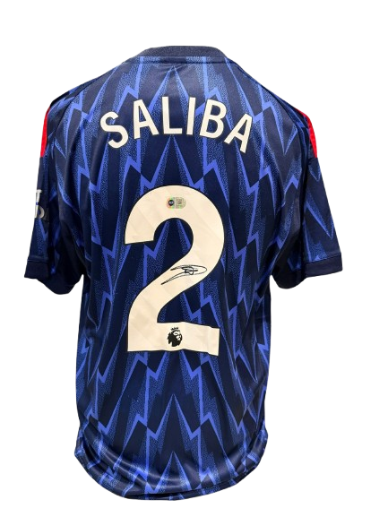 Official 2025/26 Arsenal away shirt hand-signed by William Saliba in bold permanent ink.