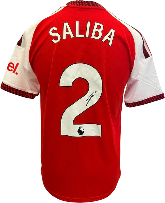 The reverse of the 2026/27 Arsenal home shirt showcasing William Saliba's hand-signed autograph clearly on his squad number.